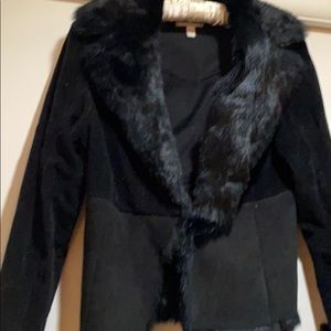 Real rabbit fur trimmed cuffs , lining and collar